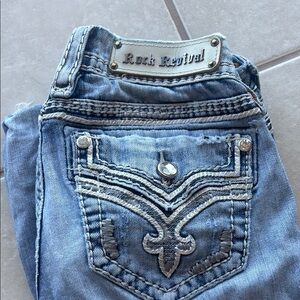 Rock Revival Blue Boot Cut Jeans with Decorative Stitching